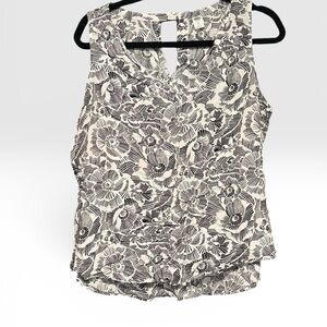 Black and white floral sleeveless shirt